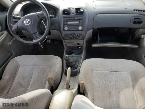 2003 Mazda Protege DX with VIN JM1BJ225131212091, listed as a Copart auction lot 82326154 with 171,184 mi miles and Salvage Title. Bid and sale history available at carsss.com. Image 8.