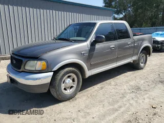 2002 Ford F-150 XLT with VIN 1FTRW07L32KA75868, listed as a Copart auction lot 47392685 with 0 mi miles and Salvage Title. Bid and sale history available at carsss.com. Image 1.