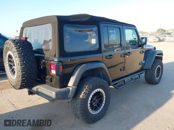 2018 Jeep Wrangler Unlimited Sport S z VIN 1C4HJXDG9JW169478, wystawiony jako IAAI lot #40387425 z przebiegiem 59 287 mil mil oraz . Historia ofert i sprzedaży dostępna na DreamBid. Obrazek 4.