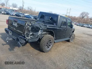 2021 Jeep Gladiator Overland z VIN 1C6HJTFG1ML606215, wystawiony jako IAAI lot #41771646 z przebiegiem 77 411 mil mil oraz . Historia ofert i sprzedaży dostępna na DreamBid. Obrazek 4.