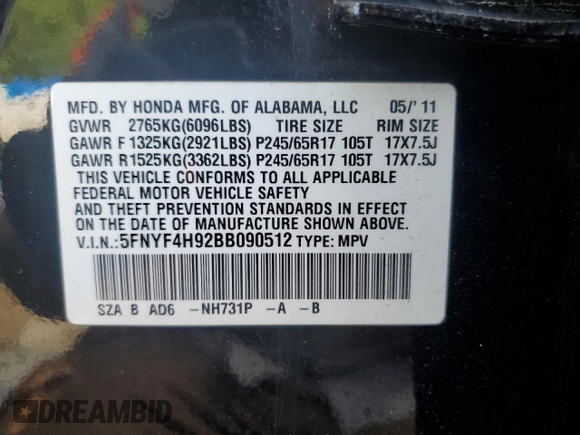 2011 Honda Pilot Touring z VIN 5FNYF4H92BB090512, wystawiony jako Copart lot #57046015 z przebiegiem 159 814 mil mil oraz Szkoda całkowita • Salvage title. Historia ofert i sprzedaży dostępna na DreamBid. Obrazek 13.