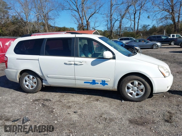 2009 Kia Sedona LX with VIN KNDMB233096312990, listed as a IAAI auction lot 41261428 with 254,323 mi miles. Bid and sale history available at carsss.com. Image 13.