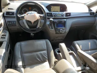 2016 Honda Odyssey Touring Elite with VIN 5FNRL5H97GB129217, listed as a Copart auction lot 52177765 with 138,045 mi miles and Salvage Title. Bid and sale history available at DreamBid. Image 8.