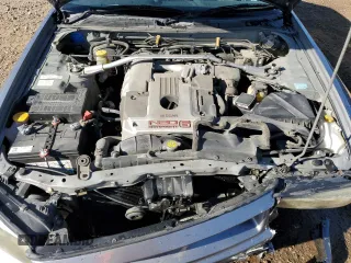 1999 Nissan Skyline z VIN HR34005885, wystawiony jako Copart lot #75422984 z przebiegiem 150 776 mil mil oraz Szkoda całkowita • Salvage title. Historia ofert i sprzedaży dostępna na DreamBid. Obrazek 11.