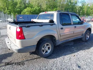 2004 Ford Explorer Sport Trac XLS z VIN 1FMZU77K84UA47217, wystawiony jako IAAI lot #42169359 z przebiegiem 169 053 mil mil oraz . Historia ofert i sprzedaży dostępna na DreamBid. Obrazek 4.