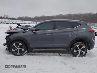 2018 Hyundai Tucson Sport z VIN KM8J3CAL2JU783060, wystawiony jako IAAI lot #41572044 z przebiegiem 83 580 mil mil oraz . Historia ofert i sprzedaży dostępna na DreamBid. Obrazek 15.