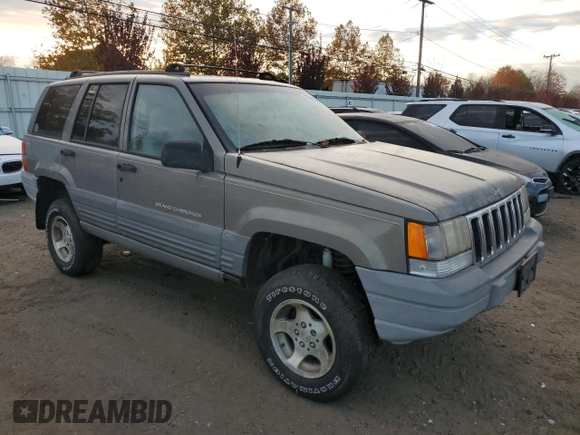 1997 Jeep Grand Cherokee Laredo with VIN 1J4GZ58S1VC741586, listed as a Copart auction lot 77619394 with 0 mi miles and Clean Title. Bid and sale history available at carsss.com. Image 4.