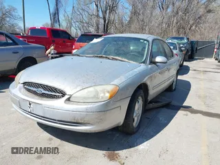 2003 Ford Taurus SE Standard with VIN 1FAFP53U53G226439, listed as a IAAI auction lot 41845541 with 215,870 mi miles. Bid and sale history available at carsss.com. Image 2.