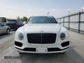 2019 Bentley Bentayga V8 z VIN SJAAM2ZV0KC026362, wystawiony jako Copart lot #54059393 z przebiegiem 31 530 mil mil oraz . Historia ofert i sprzedaży dostępna na DreamBid. Obrazek 5.