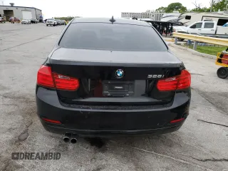 2015 BMW 3 Series 328i with VIN WBA3C1C58FK120706, listed as a Copart auction lot 54318135 with 119,988 mi miles and Salvage title. Bid and sale history available at DreamBid. Image 6.