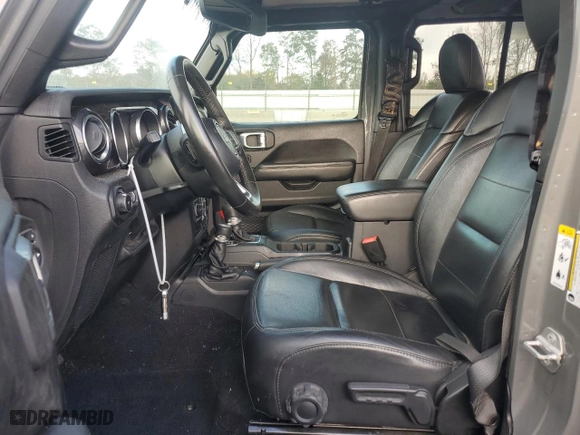2020 Jeep Wrangler Unlimited Sahara with VIN 1C4HJXENXLW105210, listed as a Copart auction lot 79345214 with 74,480 mi miles and Salvage Title. Bid and sale history available at carsss.com. Image 7.