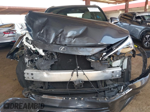 2024 Lexus TX 350 with VIN 5TDAAAB63RS002392, listed as a IAAI auction lot 42384641 with 62,857 mi miles and . Bid and sale history available at DreamBid. Image 12.