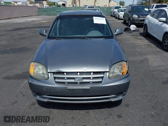 2003 Hyundai Accent GL with VIN KMHCG45C73U471607, listed as a IAAI auction lot 41956551 with 222,305 mi miles. Bid and sale history available at carsss.com. Image 6.