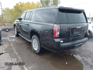 2015 GMC Yukon XL SLT with VIN 1GKS1HKC8FR219289, listed as a IAAI auction lot 40772496 with 163,477 mi miles. Bid and sale history available at carsss.com. Image 3.