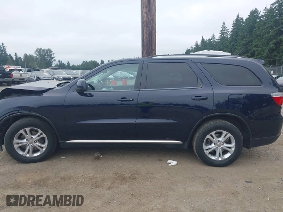 2013 Dodge Durango SXT with VIN 1C4RDJAG5DC697022, listed as a IAAI auction lot 42474060 with 159,723 mi miles and . Bid and sale history available at DreamBid. Image 14.