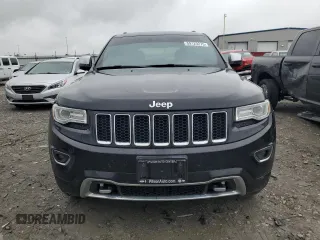 2015 Jeep Grand Cherokee Overland with VIN 1C4RJFCT2FC762573, listed as a Copart auction lot 59123275 with 229,128 mi miles and Salvage title. Bid and sale history available at DreamBid. Image 5.