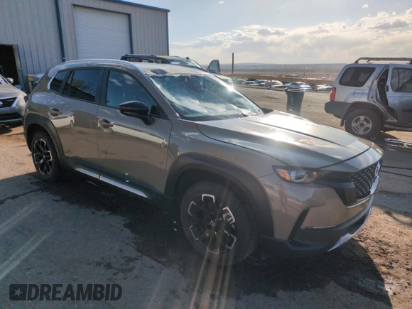 2023 Mazda CX-50 2.5 Turbo with VIN 7MMVABXY0PN152447, listed as a Copart auction lot 50781195 with 28,806 mi miles and Salvage Title. Bid and sale history available at carsss.com. Image 4.