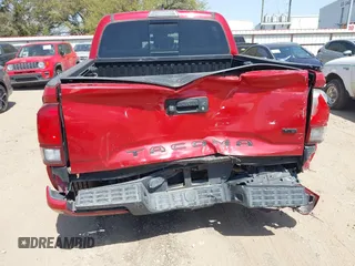 2018 Toyota Tacoma SR5 with VIN 5TFAZ5CN0JX063350, listed as a IAAI auction lot 41829396 with 61,155 mi miles and . Bid and sale history available at DreamBid. Image 6.