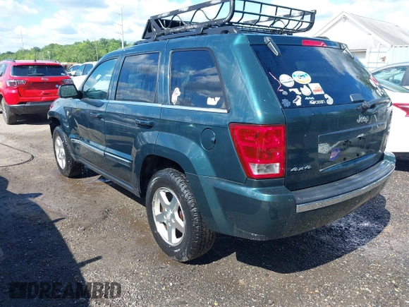 2005 Jeep Grand Cherokee Limited with VIN 1J4HR58N85C631004, listed as a IAAI auction lot 42320652 with 106,456 mi miles and . Bid and sale history available at DreamBid. Image 3.