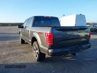 2015 Ford F-150 XLT with VIN 1FTEW1EG2FFC78324, listed as a IAAI auction lot 40708845 with 123,939 mi miles. Bid and sale history available at carsss.com. Image 3.