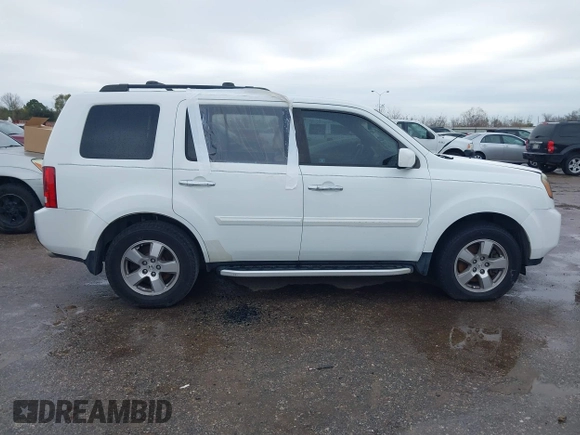 2011 Honda Pilot EX-L with VIN 5FNYF3H67BB014641, listed as a IAAI auction lot 41276698 with 193,656 mi miles and . Bid and sale history available at DreamBid. Image 13.
