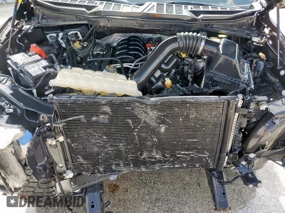2021 Ford F-150 XL с VIN 1FTFW1E5XMFB70288, выставлен на аукционе Copart как лот 87917535 с пробегом 35 111 миль миль и Списание • Salvage title. История ставок и продаж доступна на DreamBid. Изображение 11.