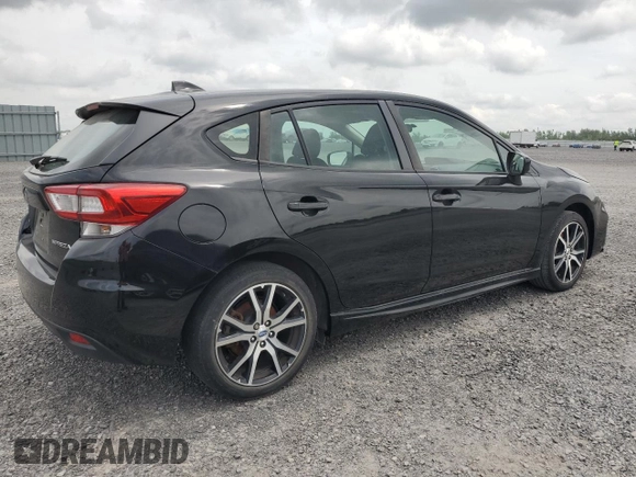 2018 Subaru Impreza with VIN 4S3GTAF65J1751579, listed as a Copart auction lot 61690535 with 77,316 mi miles and Salvage title. Bid and sale history available at DreamBid. Image 3.