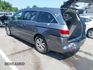 2014 Honda Odyssey EX-L with VIN 5FNRL5H63EB073585, listed as a IAAI auction lot 42673004 with 119,971 mi miles and . Bid and sale history available at DreamBid. Image 3.