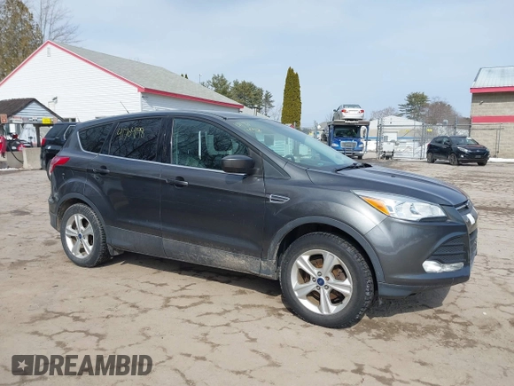 2015 Ford Escape SE with VIN 1FMCU0GXXFUB99852, listed as a IAAI auction lot 41704198 with 84,735 mi miles. Bid and sale history available at carsss.com. Image 16.