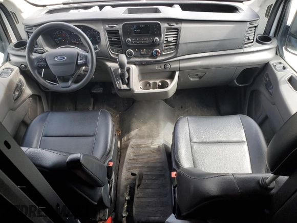 2023 Ford Transit Cargo with VIN 1FTBR2X88PKA66512, listed as a Copart auction lot 58451445 with 74,819 mi miles and Salvage title. Bid and sale history available at DreamBid. Image 8.