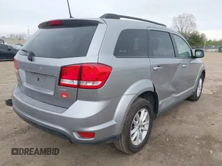 2019 Dodge Journey SE with VIN 3C4PDCBBXKT810874, listed as a IAAI auction lot 41960889 with 170,441 mi miles and . Bid and sale history available at DreamBid. Image 4.
