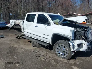 2017 GMC Sierra 2500HD Denali z VIN 1GT12UEG1HF166208, wystawiony jako IAAI lot #41806983 z przebiegiem 144 862 mil mil oraz . Historia ofert i sprzedaży dostępna na DreamBid. Obrazek 1.