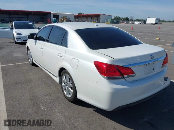 2011 Toyota Avalon with VIN 4T1BK3DB0BU414192, listed as a IAAI auction lot 42099301 with 220,967 mi miles and . Bid and sale history available at carsss.com. Image 3.