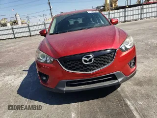 2014 Mazda CX-5 Touring with VIN JM3KE2CY9E0356050, listed as a Copart auction lot 65470674 with 70,400 mi miles and Salvage Title. Bid and sale history available at DreamBid. Image 12.