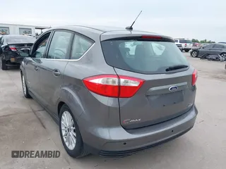 2013 Ford C-Max SEL z VIN 1FADP5BUXDL526768, wystawiony jako IAAI lot #42357018 z przebiegiem 149 659 mil mil oraz . Historia ofert i sprzedaży dostępna na DreamBid. Obrazek 3.