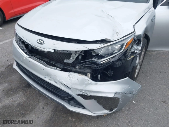 2019 Kia Optima LX with VIN 5XXGT4L3XKG285486, listed as a IAAI auction lot 41872981 with 101,981 mi miles. Bid and sale history available at carsss.com. Image 6.