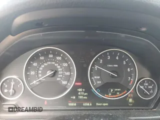 2013 BMW 3 Series 328i xDrive with VIN WBA3B5C52DJ599198, listed as a Copart auction lot 56463365 with 98,808 mi miles and Salvage title. Bid and sale history available at DreamBid. Image 9.