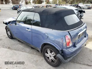 2007 MINI Convertible with VIN WMWRF33537TF66807, listed as a Copart auction lot 43664845 with 91,079 mi miles and Salvage Title. Bid and sale history available at DreamBid. Image 2.