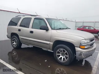2000 Chevrolet New Tahoe LT with VIN 1GNEK13T2YJ189307, listed as a IAAI auction lot 41637442 with 220,906 mi miles. Bid and sale history available at carsss.com. Image 1.