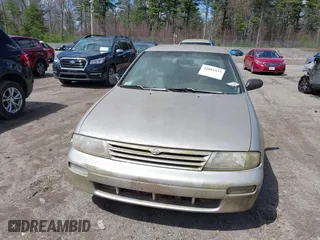 1997 Nissan Altima XE with VIN 1N4BU31D8VT205299, listed as a IAAI auction lot 42081935 with 235,426 mi miles. Bid and sale history available at carsss.com. Image 6.