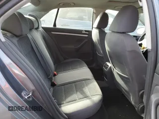 2009 Volkswagen Jetta z VIN 3VWHZ71KX9M011693, wystawiony jako Copart lot #87076904 z przebiegiem 157 478 mil mil oraz Szkoda całkowita • Salvage title. Historia ofert i sprzedaży dostępna na DreamBid. Obrazek 10.