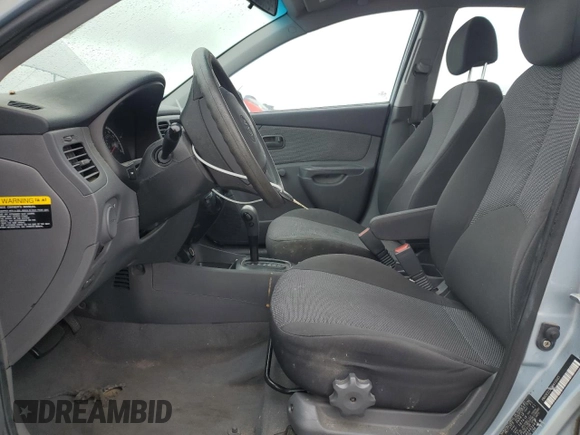 2009 Kia Rio LX with VIN KNADE223396443465, listed as a Copart auction lot 51370975 with 110,952 mi miles and Salvage Title. Bid and sale history available at carsss.com. Image 7.