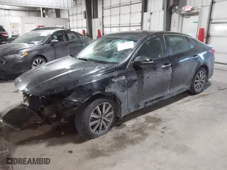 2019 Kia Optima LX with VIN 5XXGT4L3XKG377990, listed as a IAAI auction lot 41636972 with 140,864 mi miles. Bid and sale history available at carsss.com. Image 18.