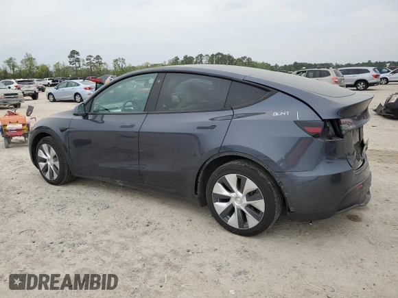 2022 Tesla Model Y Long Range with VIN 7SAYGDEE1NF315198, listed as a Copart auction lot 50399005 with 33,357 mi miles and Salvage Title. Bid and sale history available at DreamBid. Image 2.