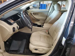 2015 Ford Taurus SEL with VIN 1FAHP2E84FG102318, listed as a Copart auction lot 61744685 with 82,149 mi miles and Salvage title. Bid and sale history available at DreamBid. Image 7.
