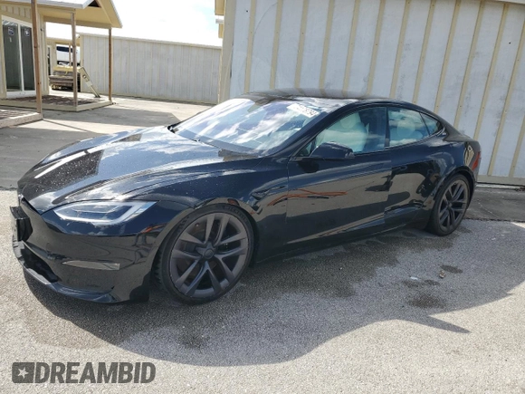 2022 Tesla Model S Plaid z VIN 5YJSA1E64NF461218, wystawiony jako Copart lot #74178794 z przebiegiem Nie podano mil oraz Szkoda całkowita • Salvage title. Historia ofert i sprzedaży dostępna na DreamBid. Obrazek 1.