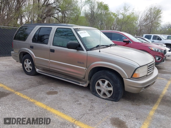 2001 Oldsmobile Bravada z VIN 1GHDT13WX12110603, wystawiony jako IAAI lot #41911383 z przebiegiem 164 916 mil mil oraz . Historia ofert i sprzedaży dostępna na DreamBid. Obrazek 1.