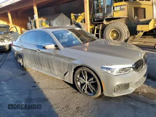 2019 BMW 5 Series M550i xDrive with VIN WBAJB9C55KB288709, listed as a Copart auction lot 46590735 with 58,256 mi miles and Salvage title. Bid and sale history available at DreamBid. Image 4.