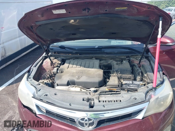 2013 Toyota Avalon XLE z VIN 4T1BK1EB6DU029564, wystawiony jako IAAI lot #42425157 z przebiegiem 228 767 mil mil oraz . Historia ofert i sprzedaży dostępna na DreamBid. Obrazek 10.
