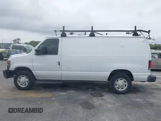 2013 Ford Econoline Cargo Commercial with VIN 1FTNE2EW6DDA10949, listed as a IAAI auction lot 41979346 with 250,952 mi miles and . Bid and sale history available at DreamBid. Image 14.